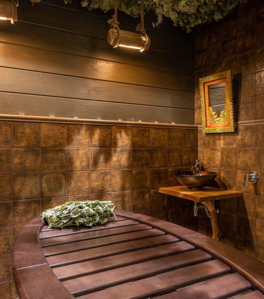Luxurious spa room featuring wooden elements and ambient lighting, ideal for relaxation and rejuvenation.